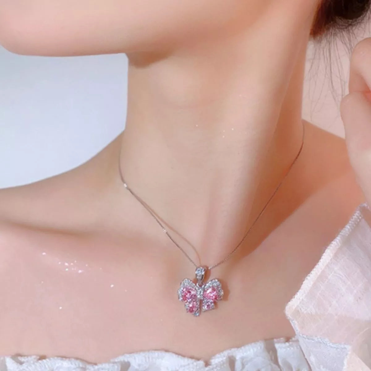 Zircon Bow Pendant Necklace Secondary image